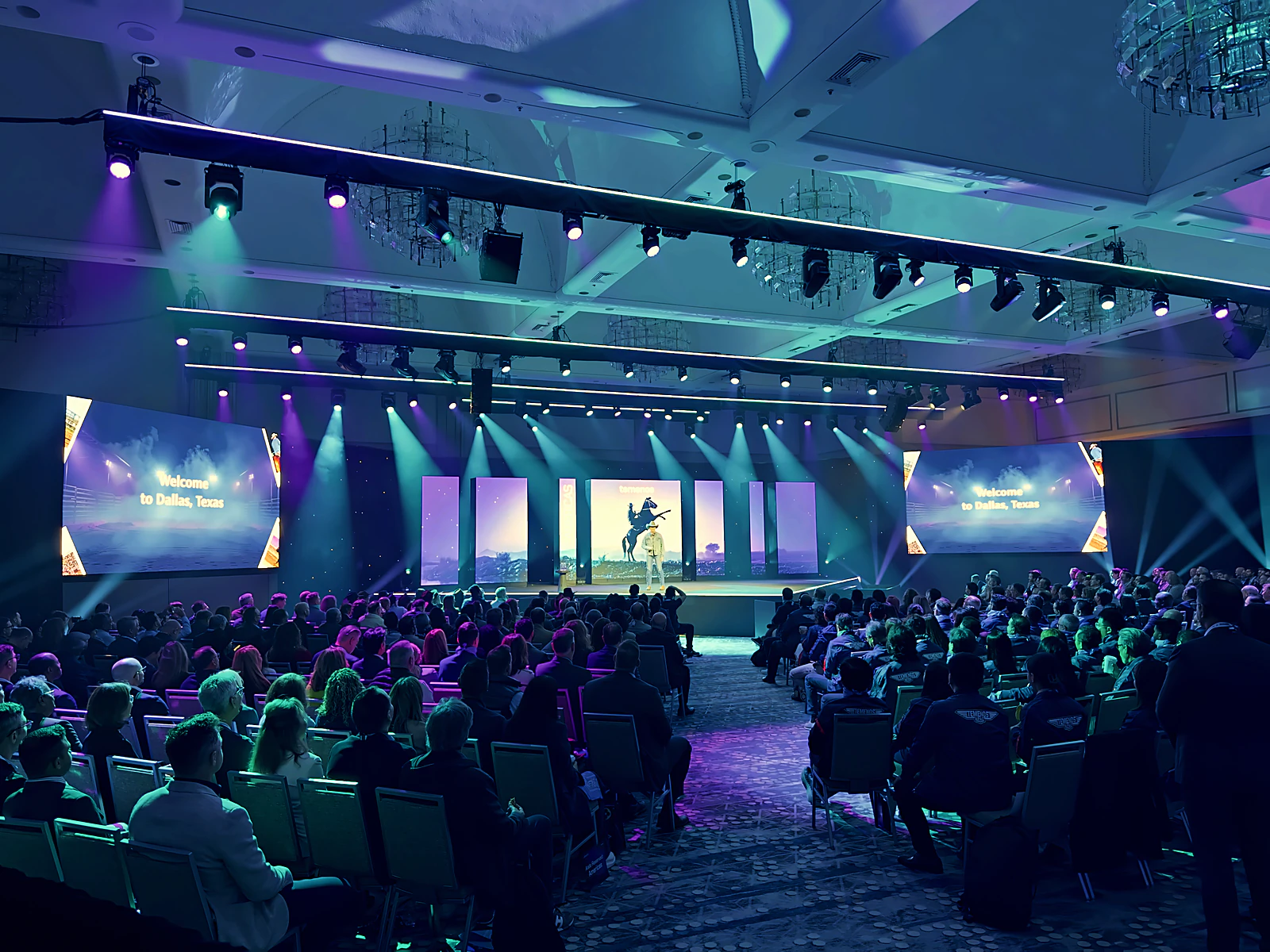 A packed general session for a global financial-services kickoff