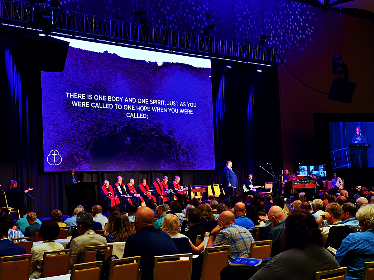 The Global Methodist Church convening in session under the one-body-one-spirit scripture
