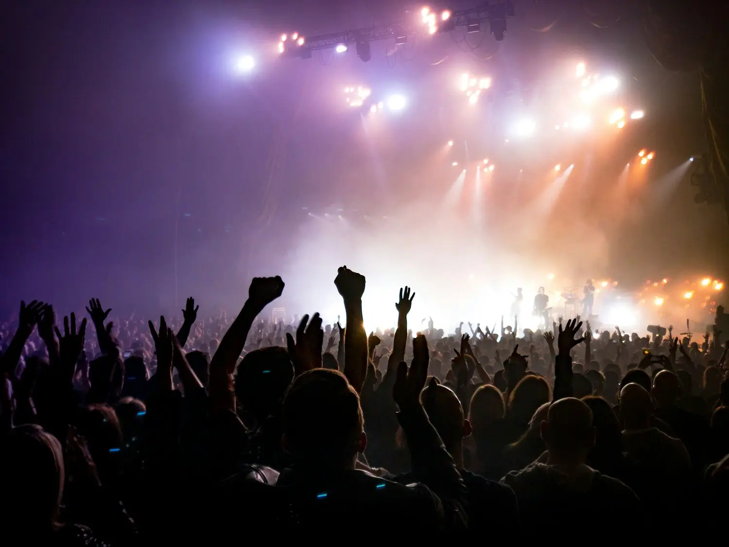 Stage under cinematic lighting at a Houston corporate event production